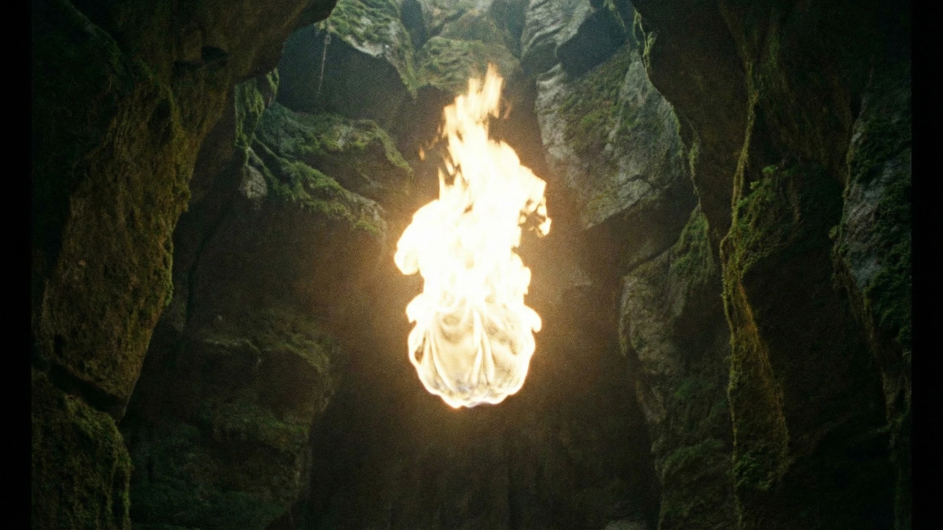 Feu pur brillant au milieu des ténèbres, symbolisant la justice et la sainteté de Dieu.